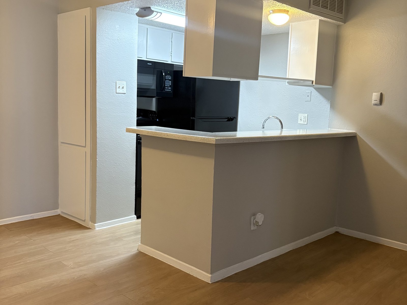 Kitchen inside an Interlace apartment
